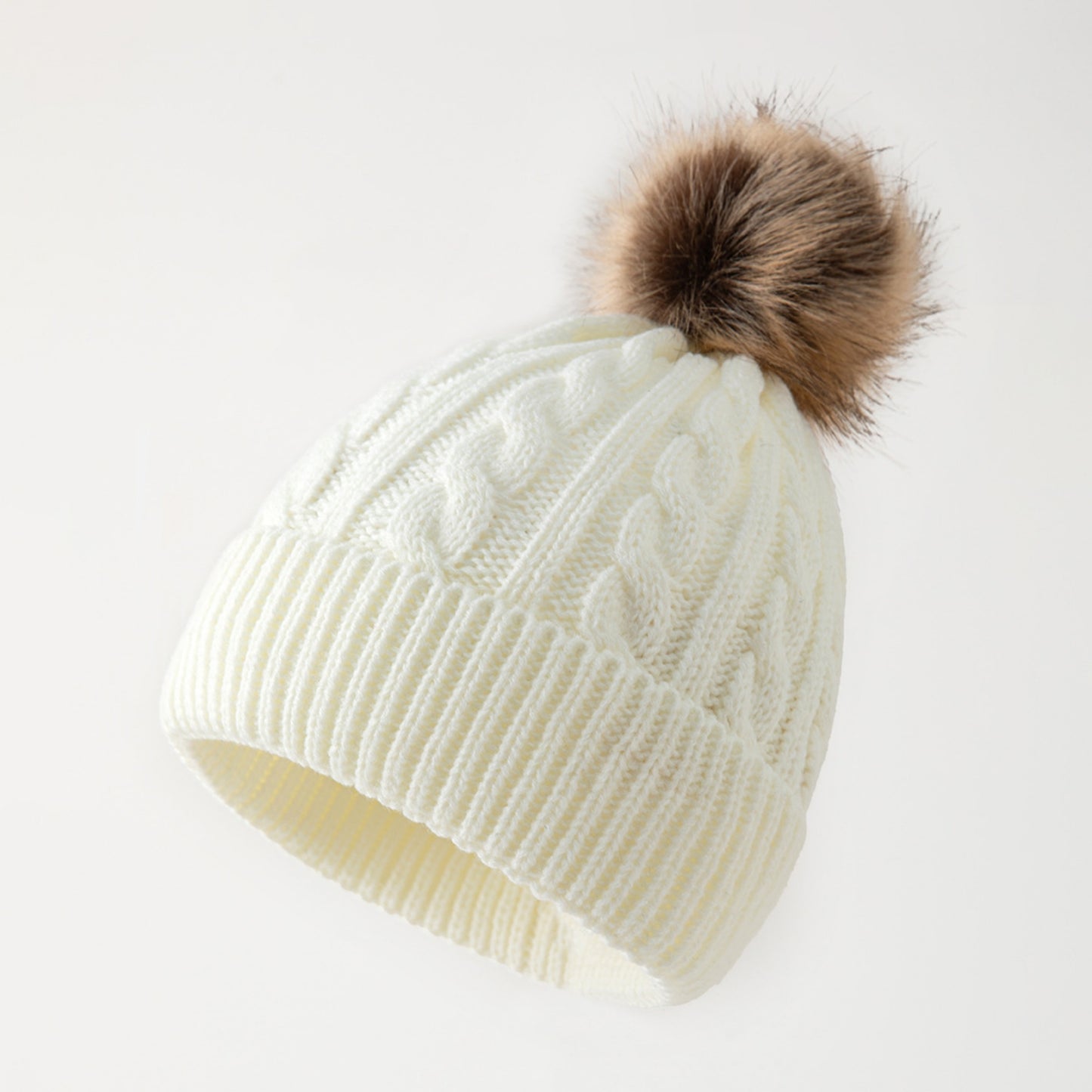 Retro cable knit beanie with pom-pom