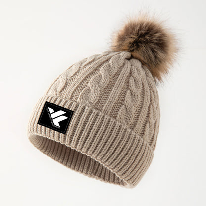 Retro cable knit beanie with pom-pom