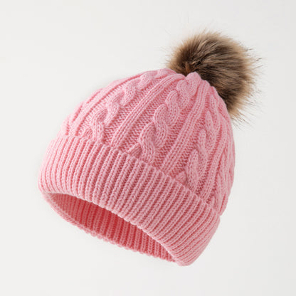 Retro cable knit beanie with pom-pom