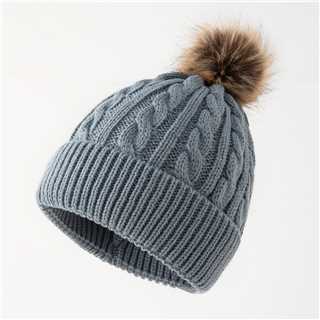 Retro cable knit beanie with pom-pom