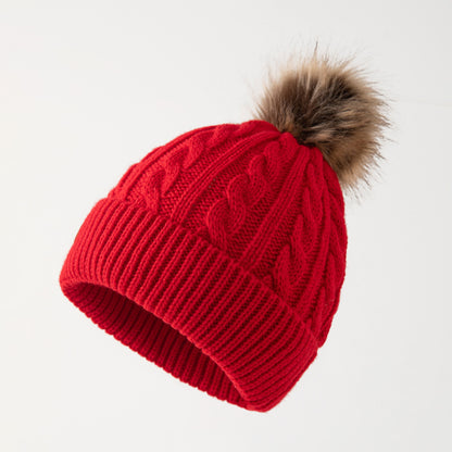 Retro cable knit beanie with pom-pom